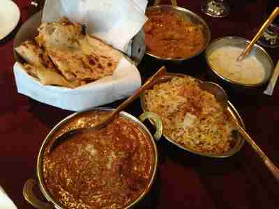 Madras Chicken, Naan, Pulao Rice, and Raita